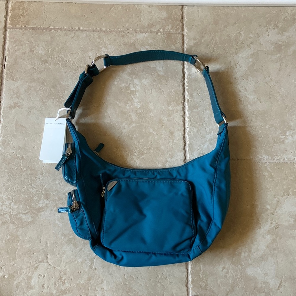 Francesco Biasia canvas with leather trim bag in aqua color